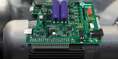 Motor control daughterboard aids provides space vector modulation