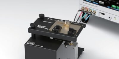 Test fixture takes irregular shapes for surface mount and leaded components